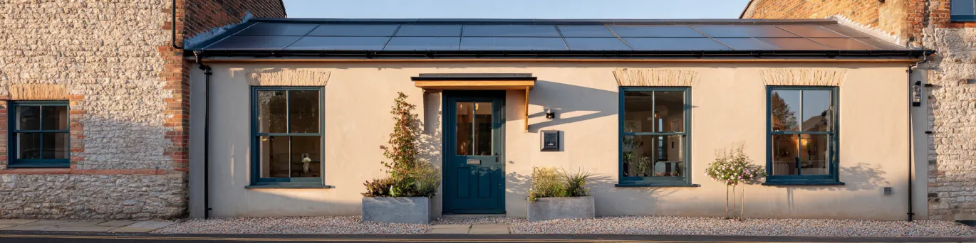 Transformer une maison ancienne en maison passive : étapes, budget et aides